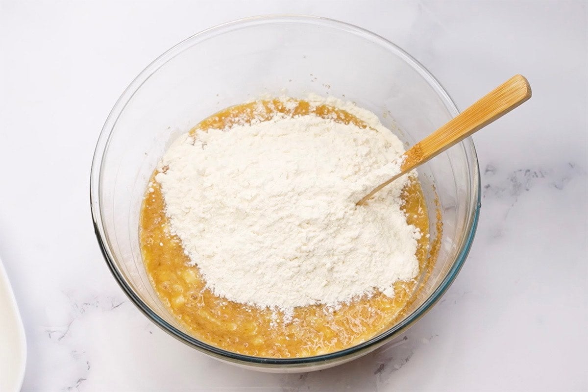 banana bread batter in mixing bowl.