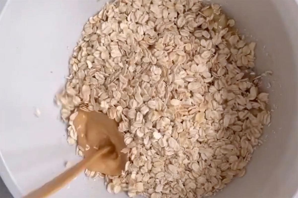 oats, mashed banana, and almond butter in a bowl.