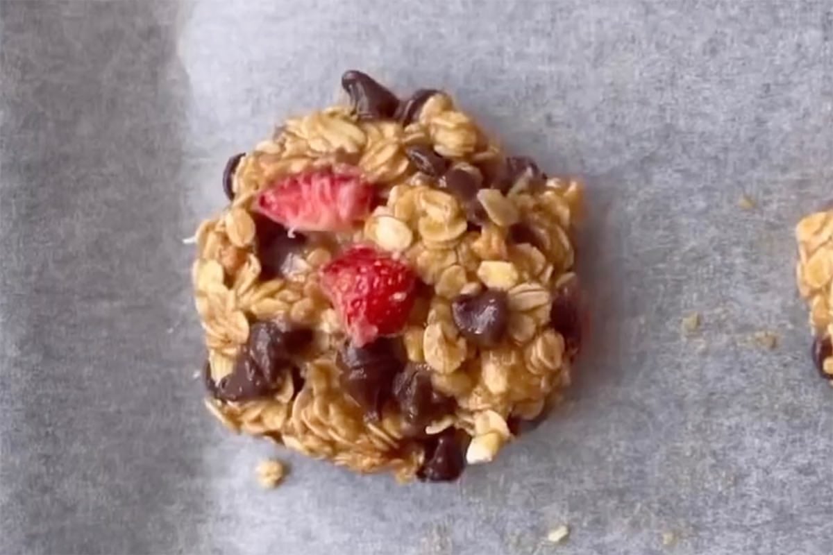 shaped unbaked cookies on baking sheet.