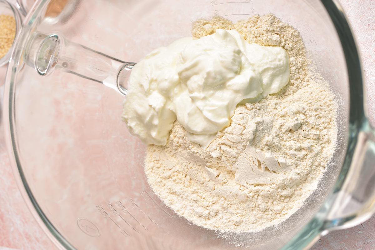 yogurt and flour in a mixing bowl.