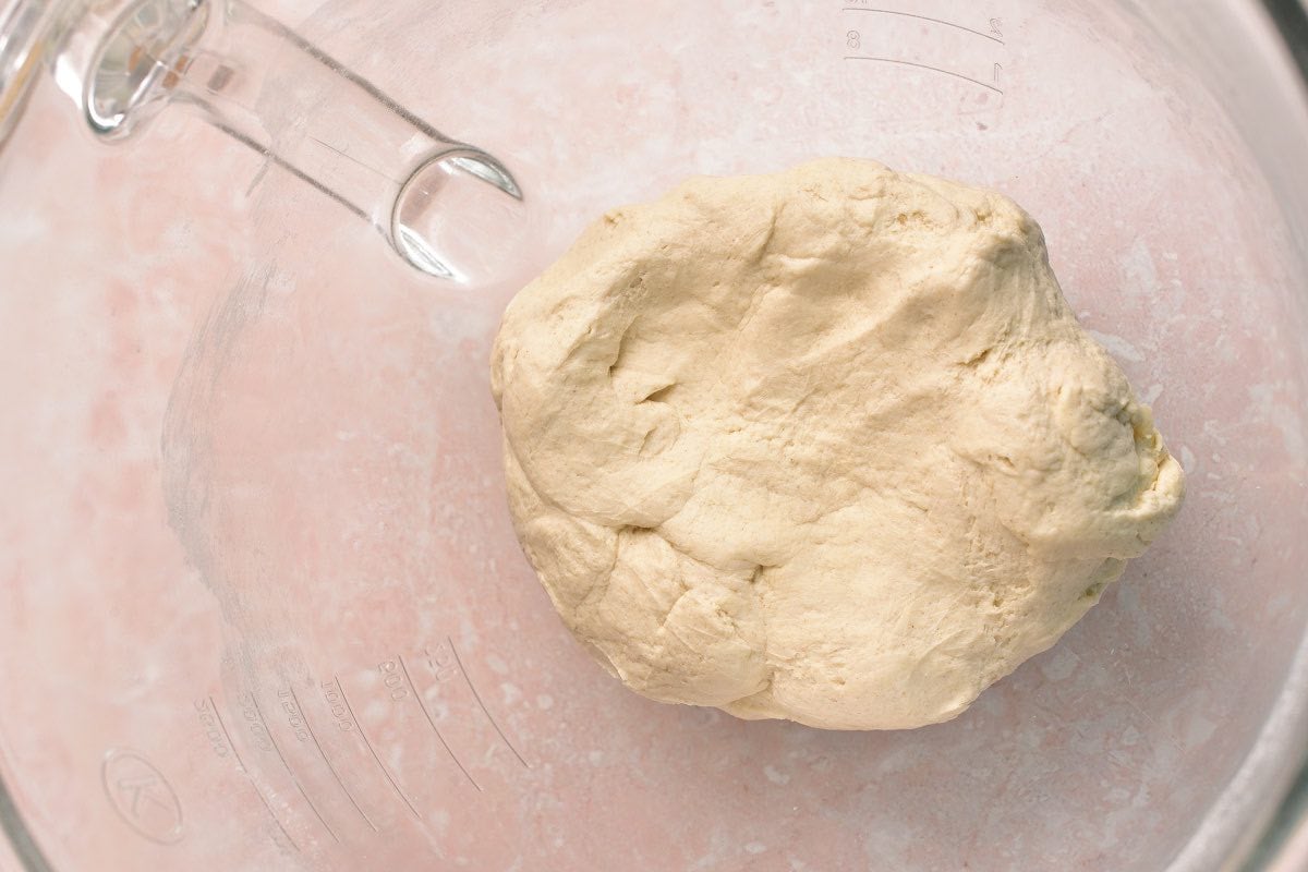 kneaded dough in a bowl.