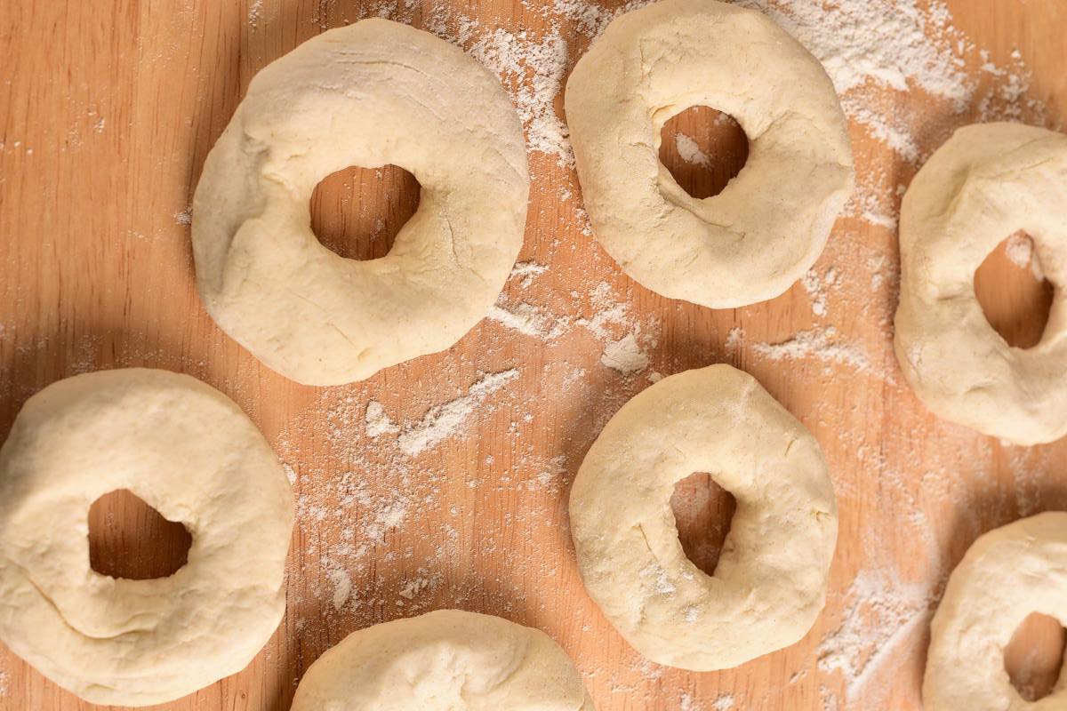 shaped unbaked bagels.