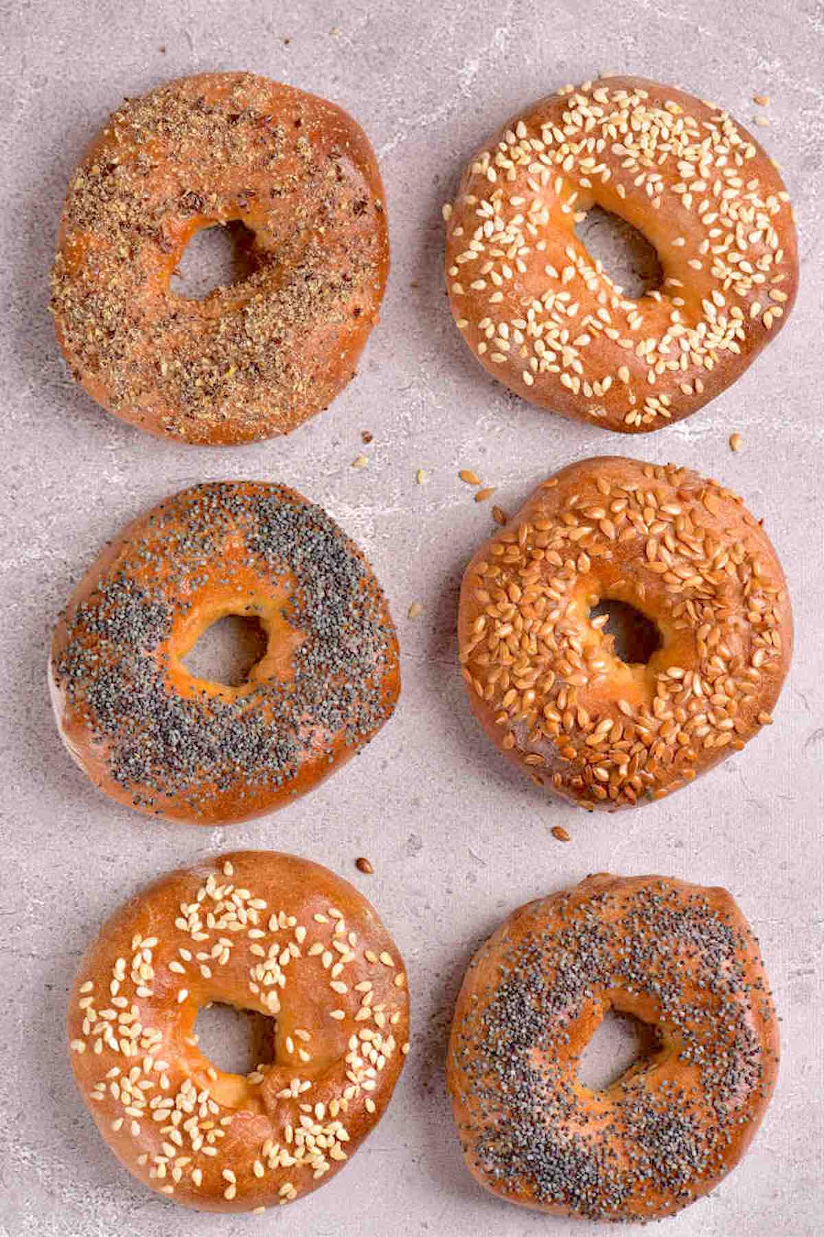 protein bagels on a baking sheet.