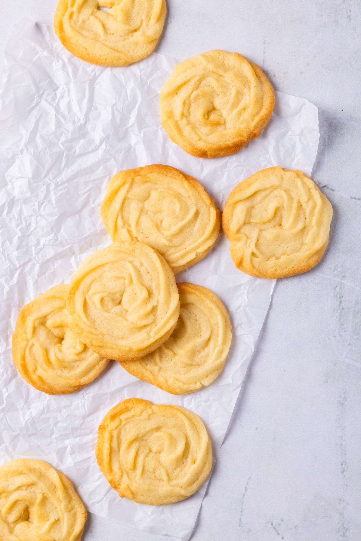 Danish butter cookies on a white board.