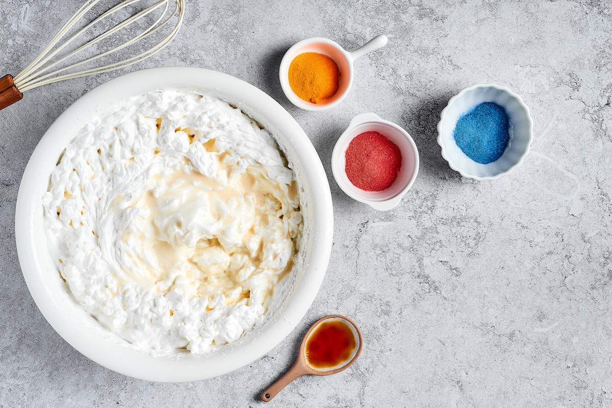 condensed milk and whipped cream in bowl.