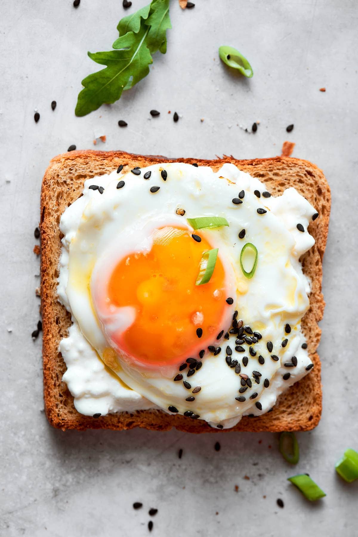 cottage cheese toast with poached egg and everything but the bagel seasoning.