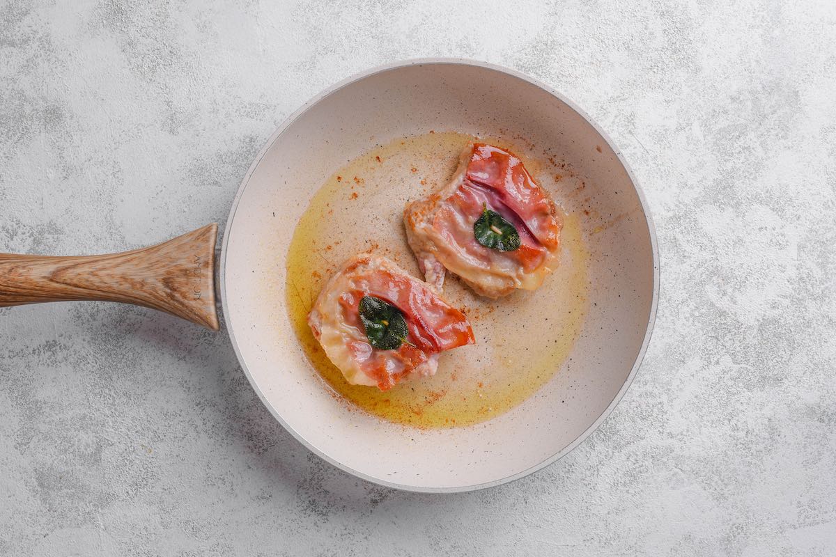 pan frying veal saltimbocca.