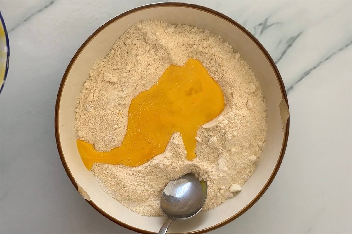 eggs and almond flour in a mixing bowl.