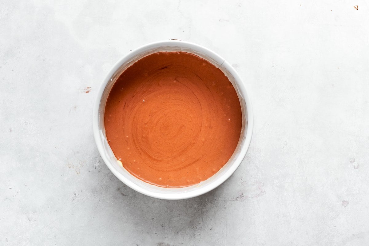 unbaked cottage cheese cake in cake pan.