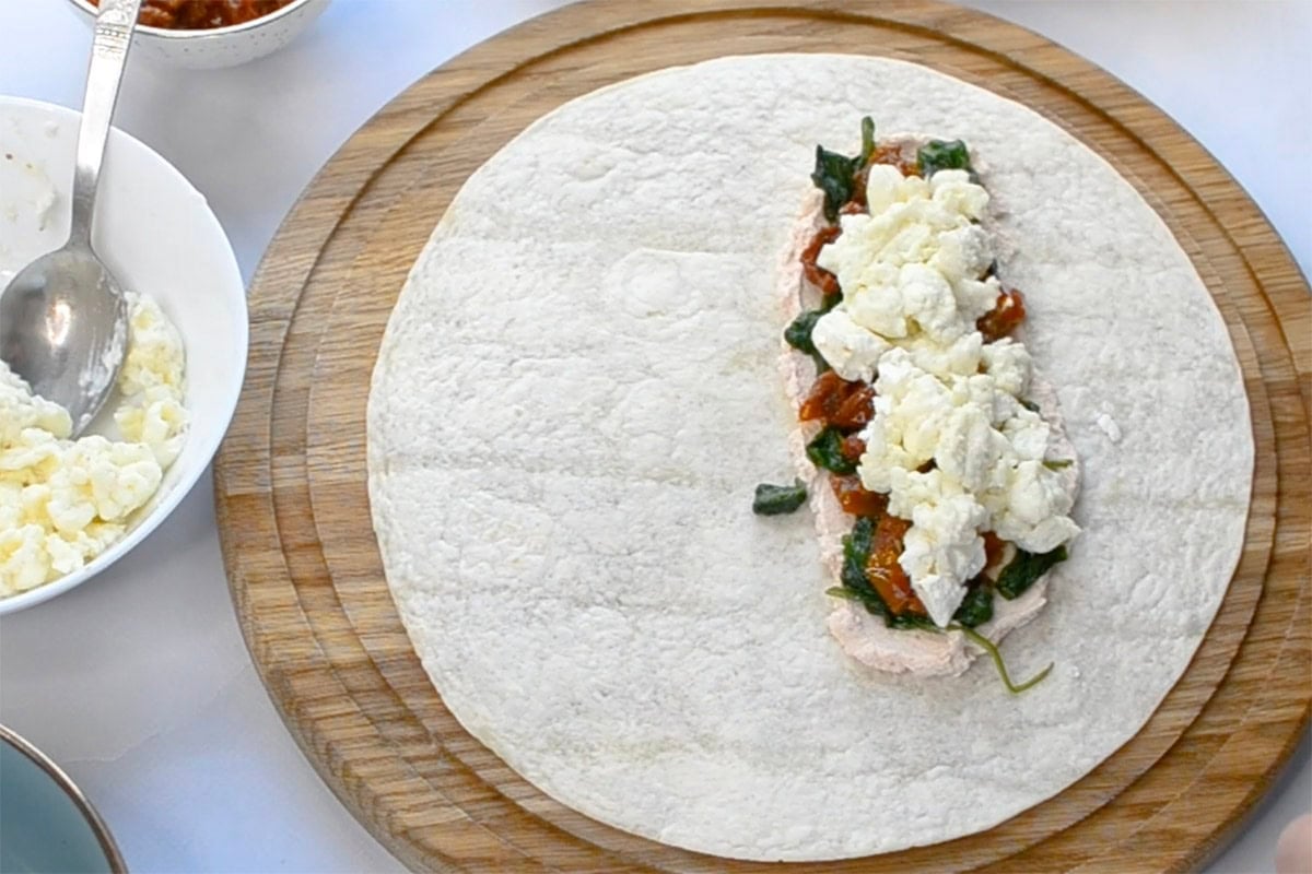 tortilla with egg whites, spinach, sun-dried tomatoes, and feta cheese.