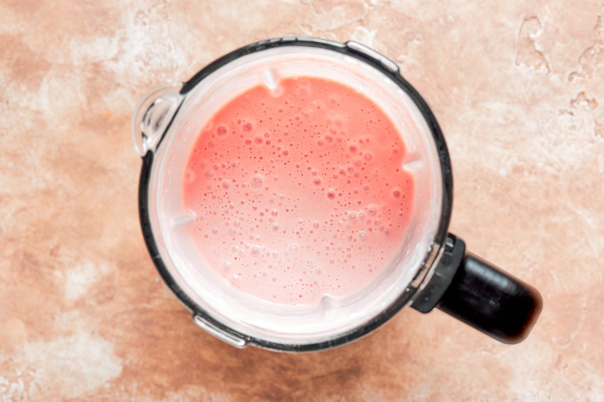 blended cottage cheese smoothie in a blender.