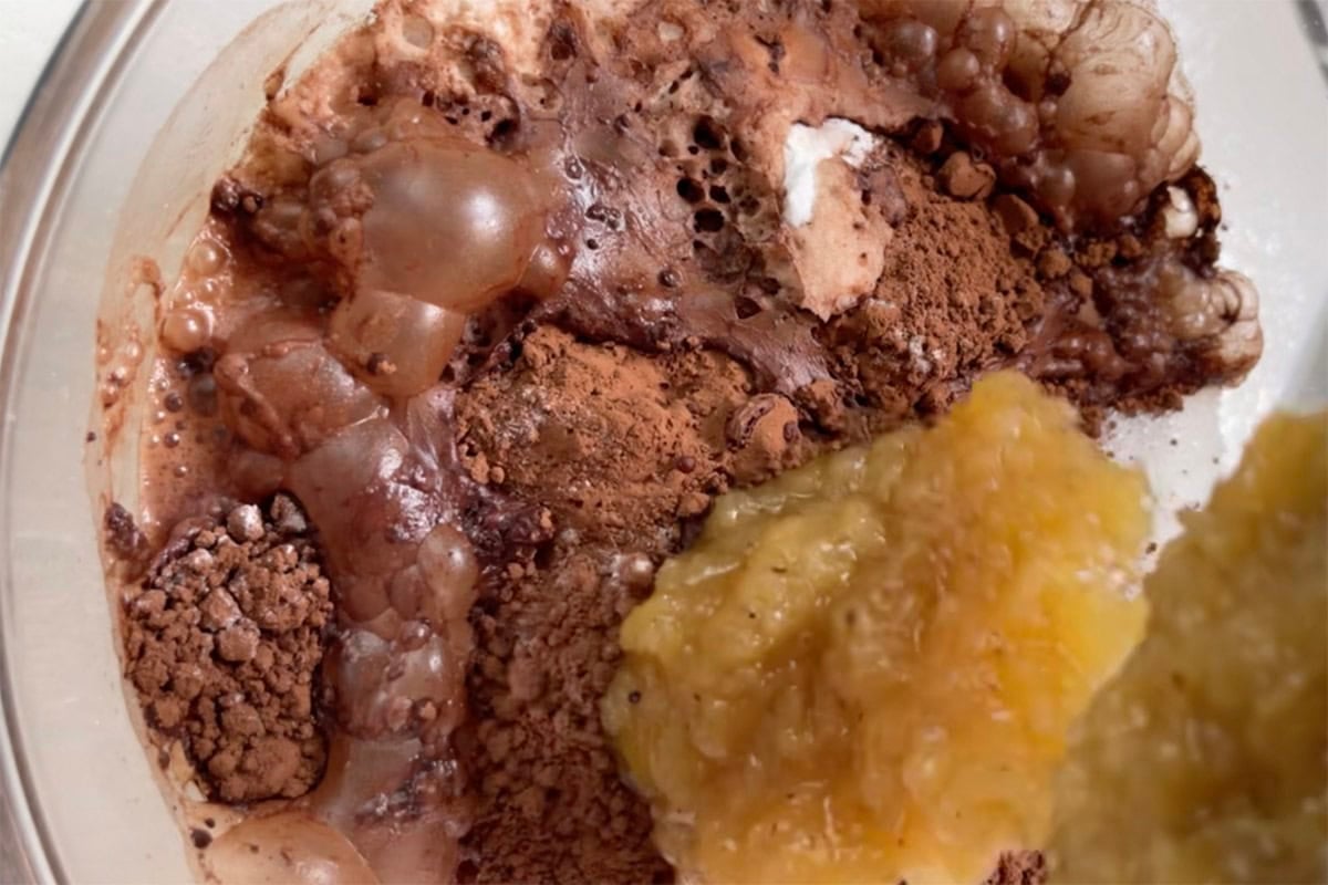 applesauce, water, and vinegar added to bowl.