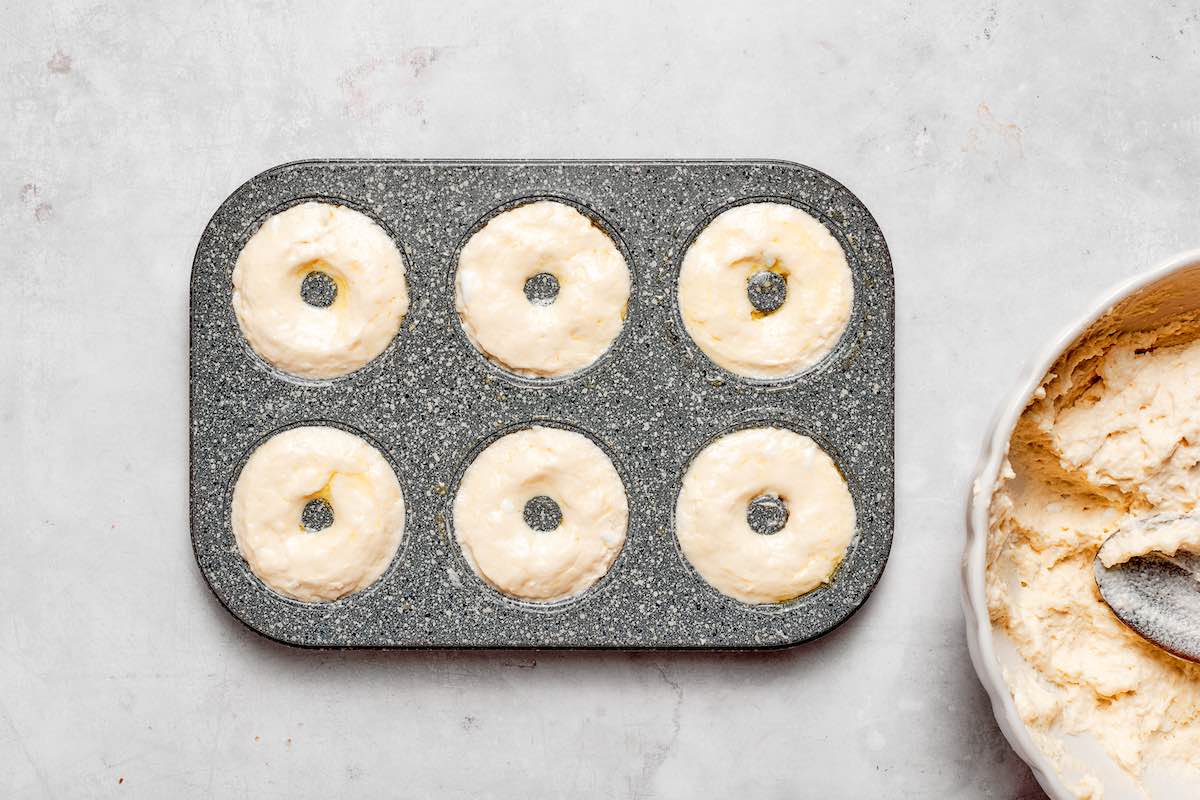 donut dough in a donut pan.