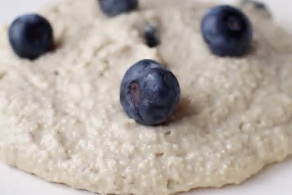 pancakes cooking on a skillet.