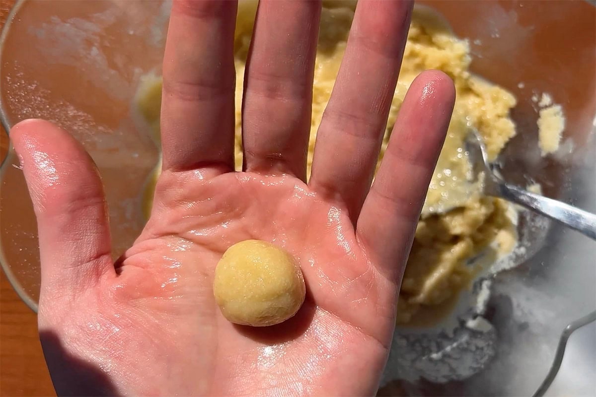 rolling balls of cereal.