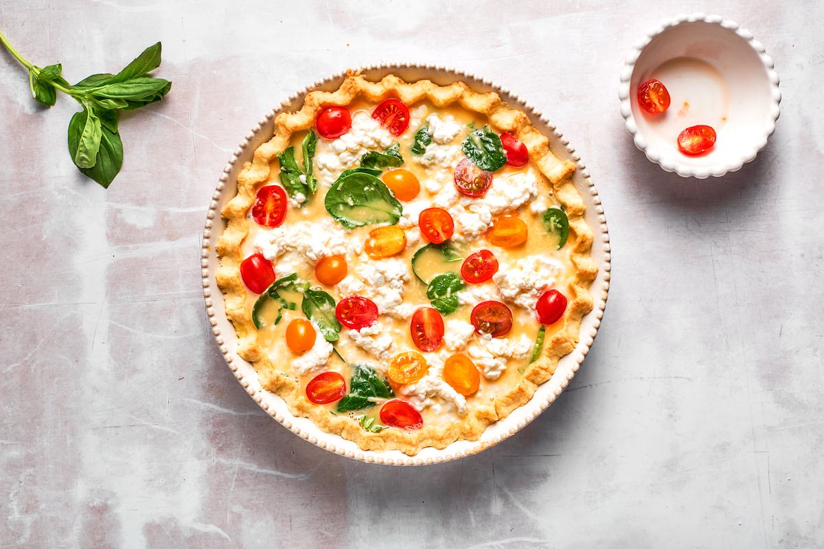 assembled cottage cheese quiche in a pie crust.