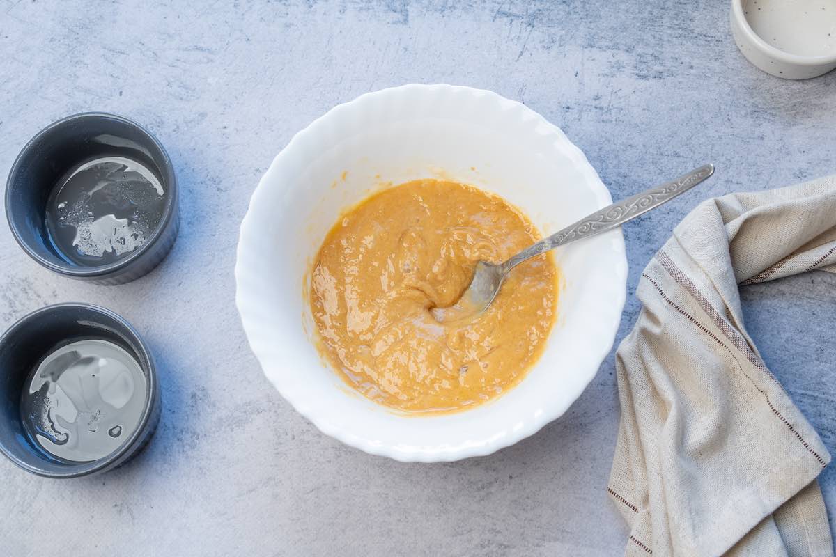 mug cake batter in a mixing bowl.