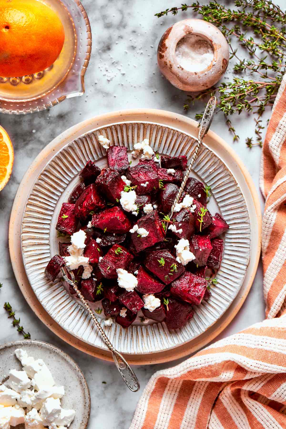 air fried beets in a bowl with fresh parsley and crumbled feta.