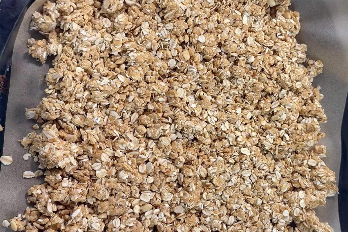 protein granola mixture on a baking sheet.