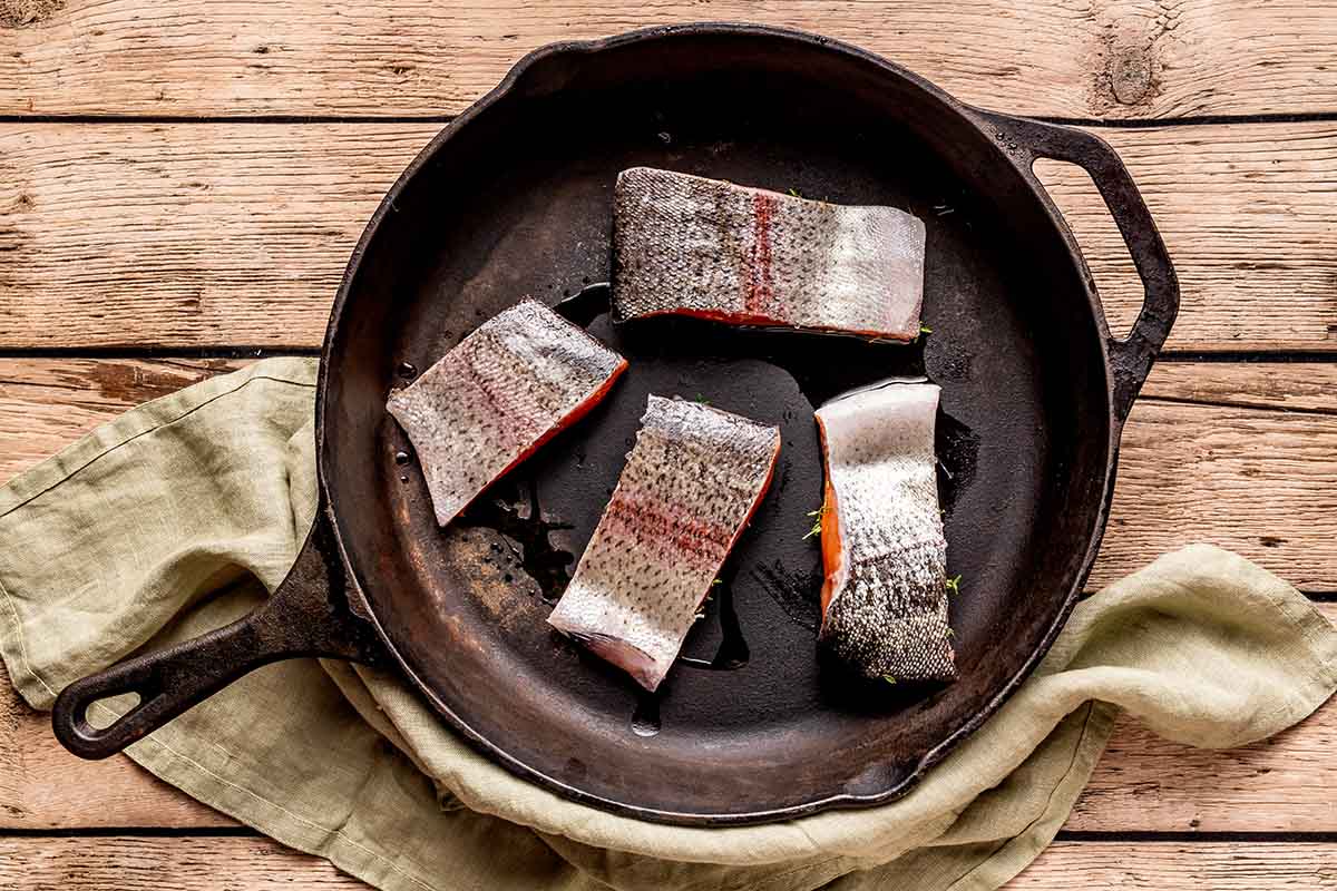 steelhead trout in skillet.