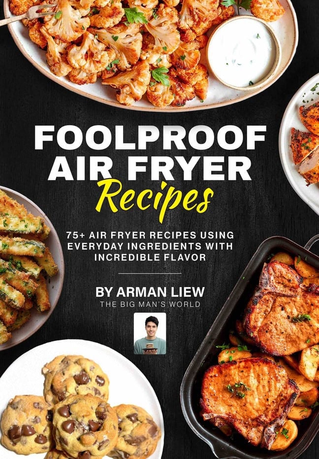 Foolproof air fryer recipes cookbook cover by Arman Liew of The Big Man’s World featuring air fryer cauliflower, air fryer pork chops, air fryer zucchini fries, and air fryer chocolate chip cookies.