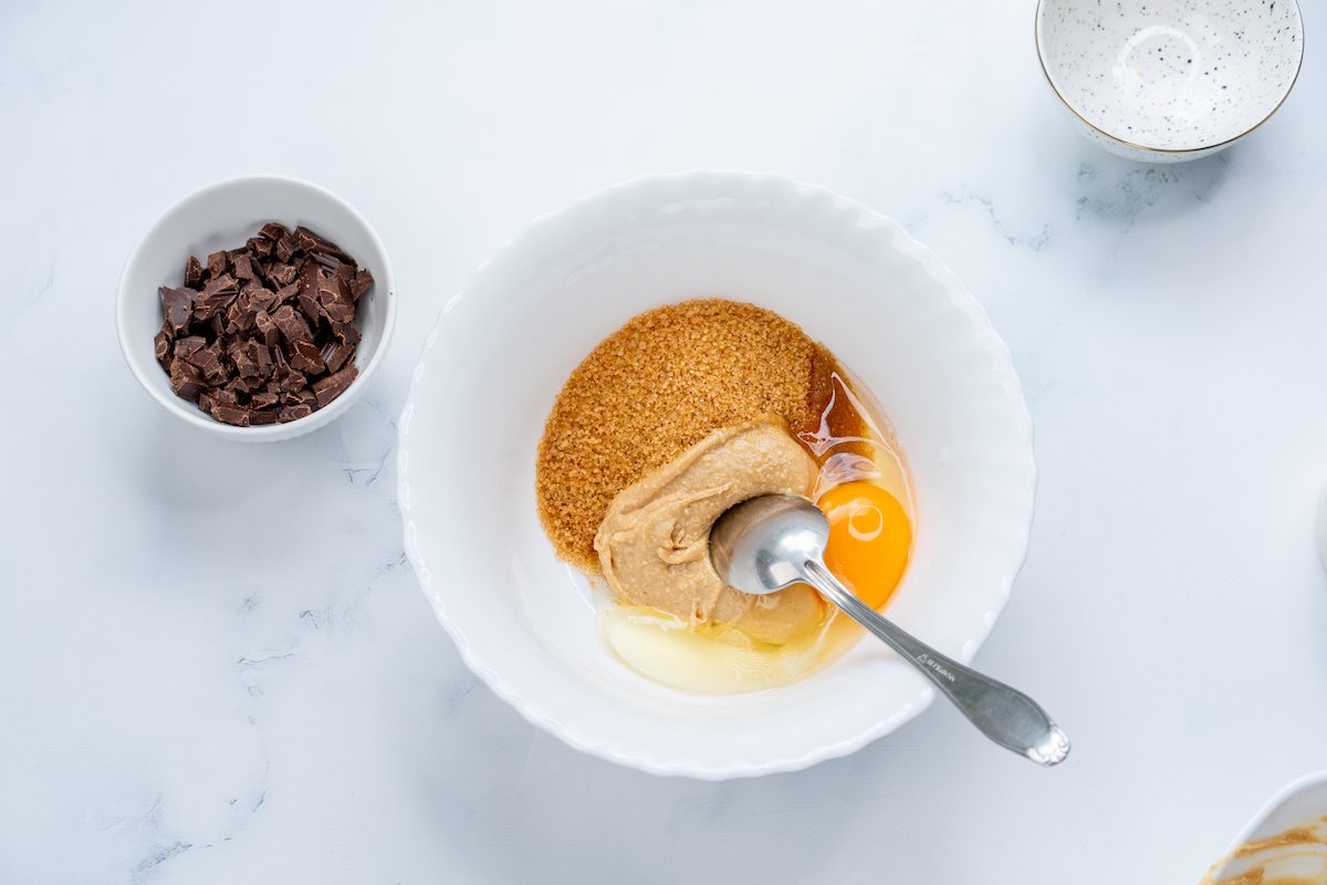 almond butter, egg, and brown sugar in a mixing bowl.