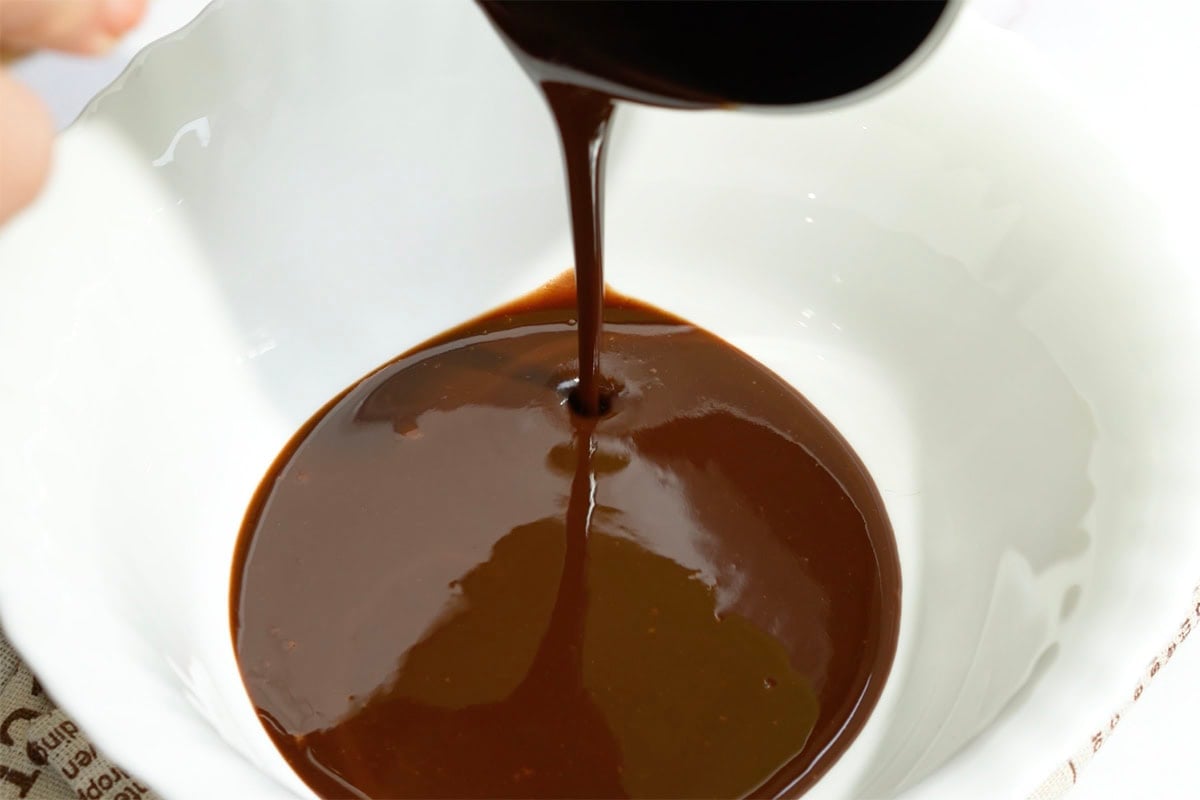 melted chocolate in a white mixing bowl.
