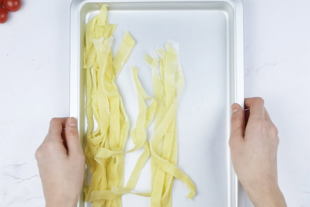 strips of uncooked keto pasta.