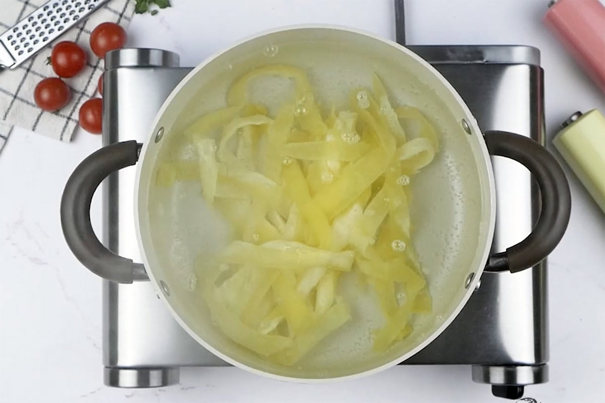 keto noodles boiling in a pot of water.