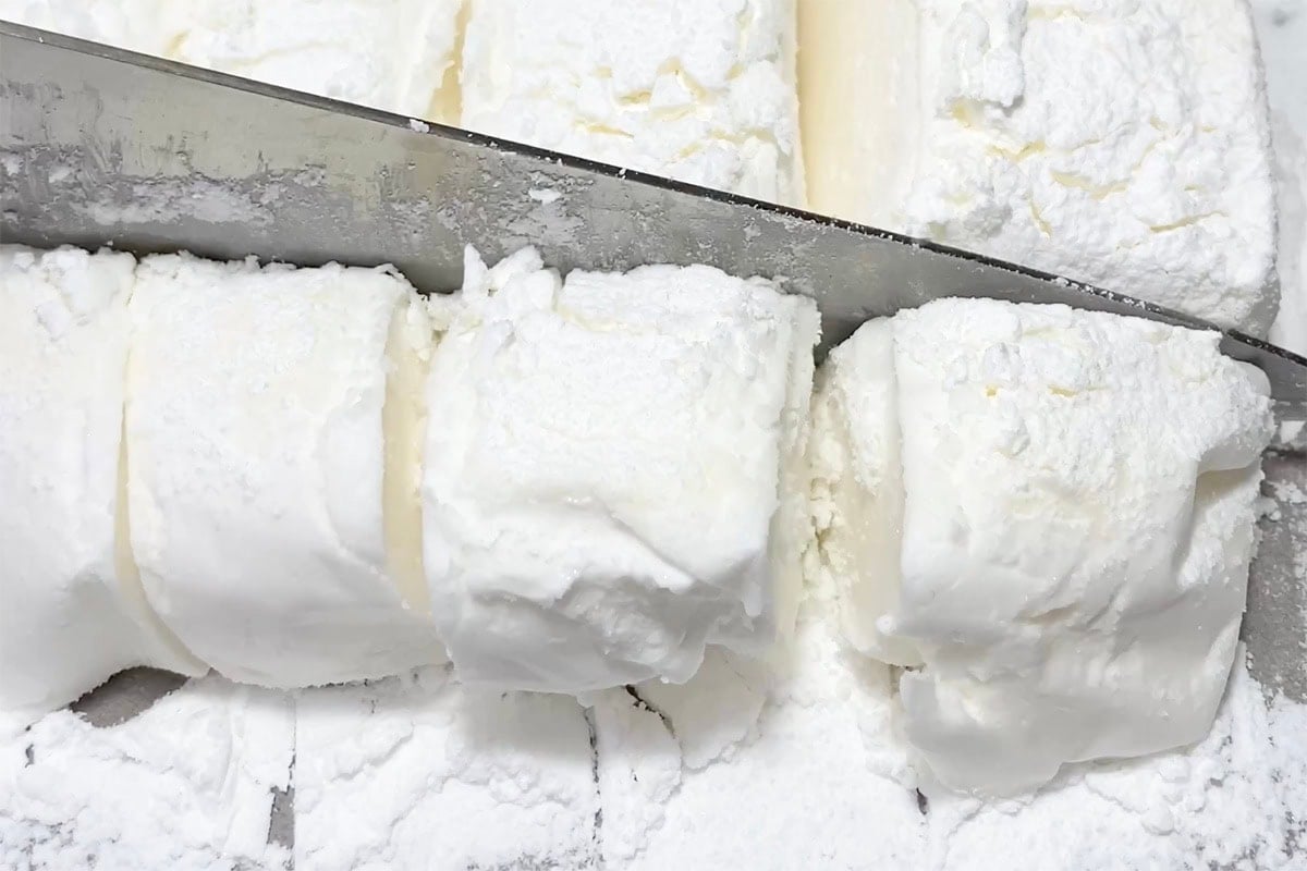 slicing sugar free marshmallows.