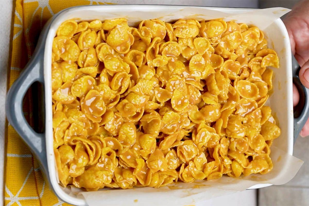cornflake bars setting in a baking dish.