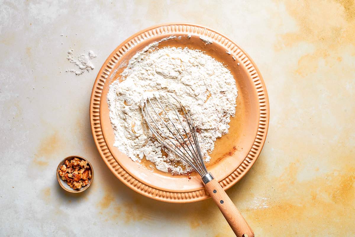 air fryer banana bread batter in a mixing bowl.