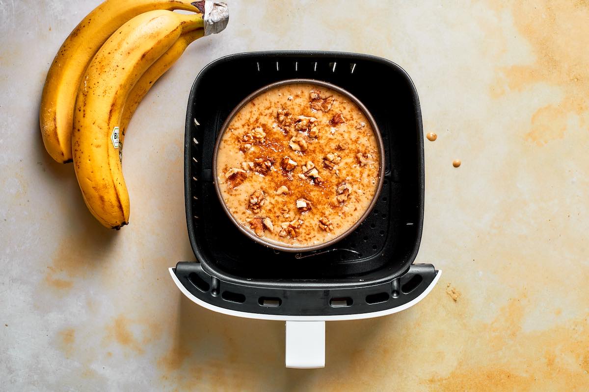 banana bread in air fryer basket.