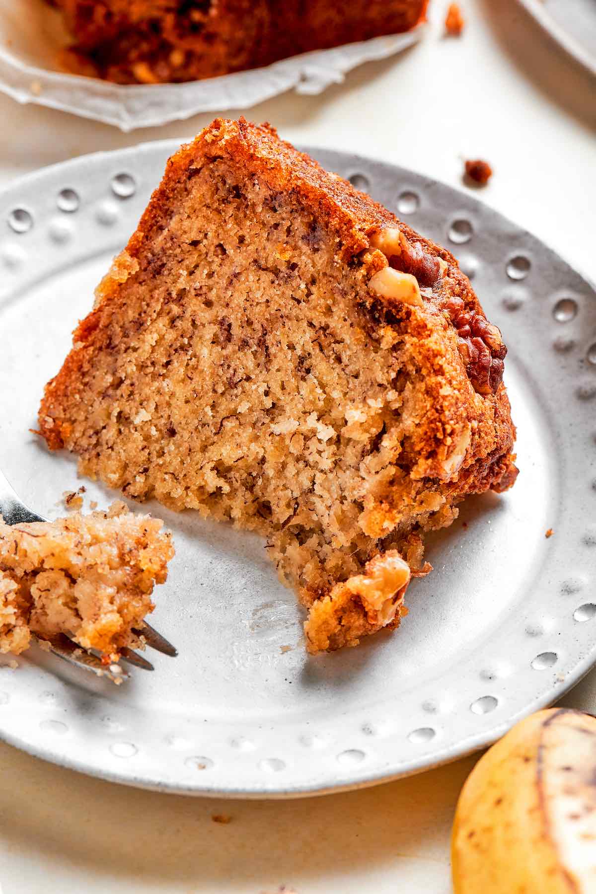 air fryer banana bread on a white plate.