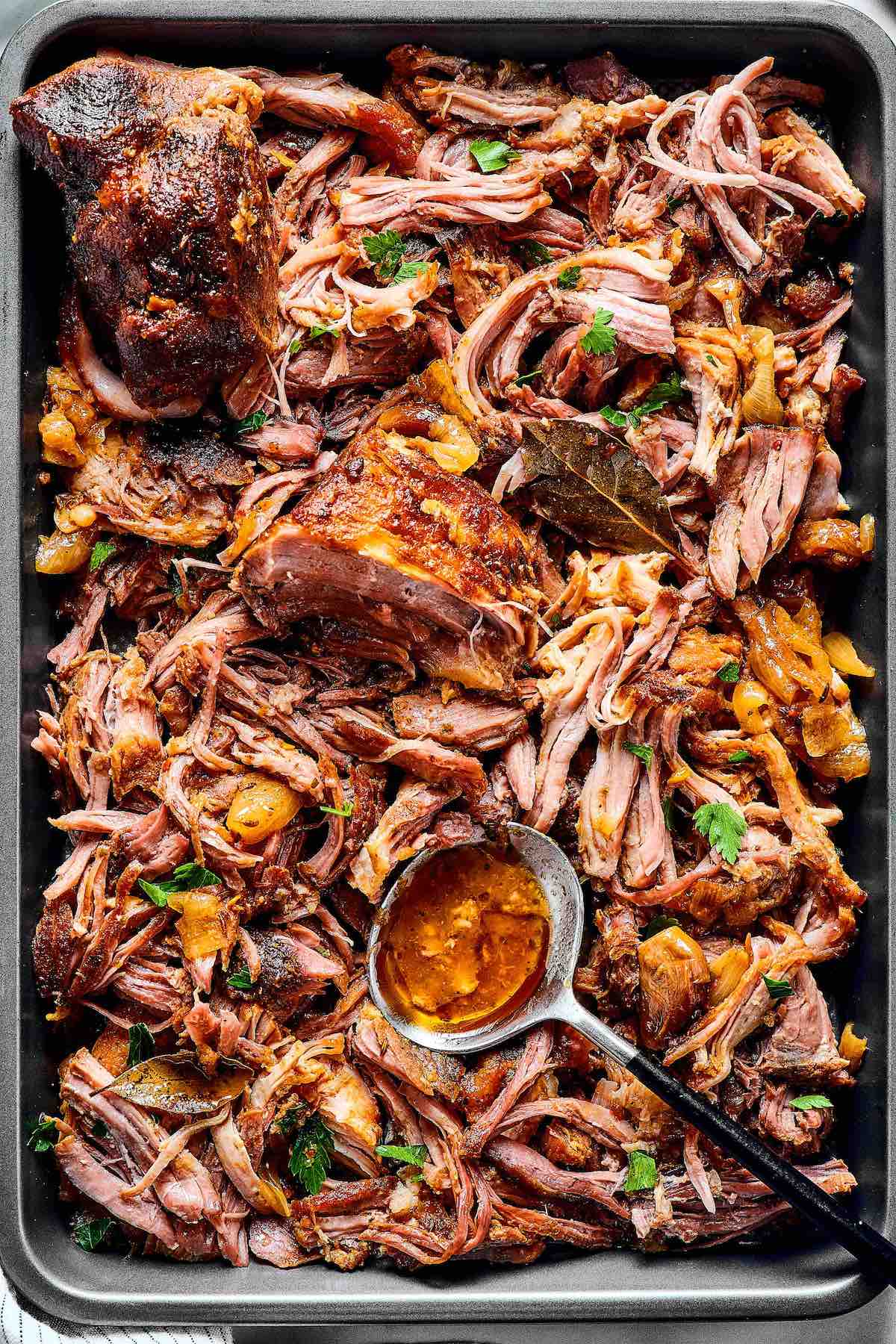 chipotle carnitas in a tray.