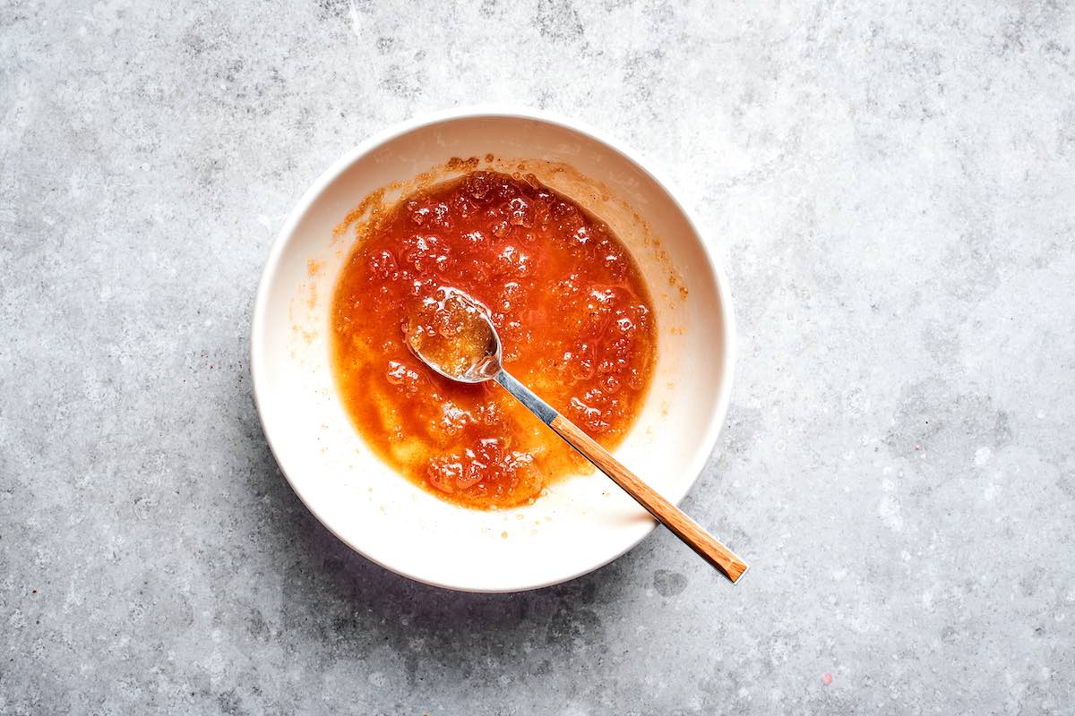 brown sugar, melted butter, honey, cinnamon, and salt in a white mixing bowl.