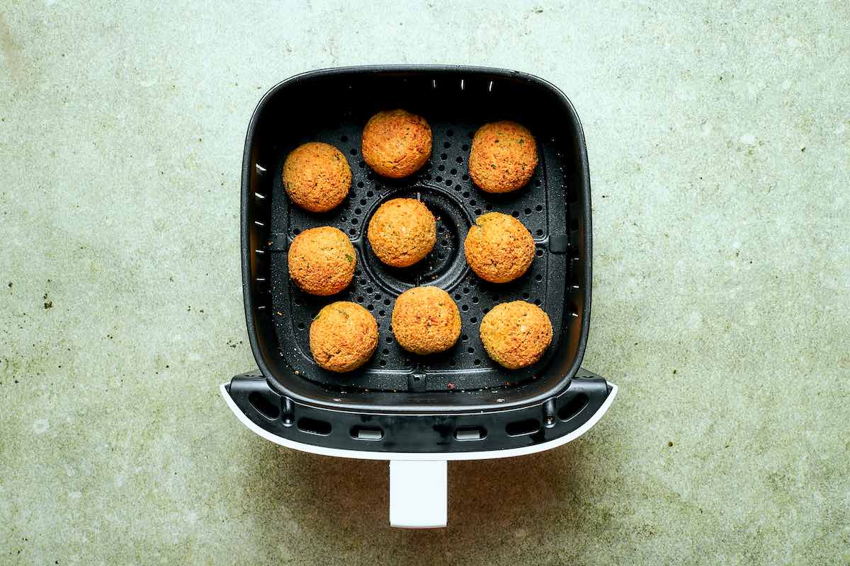 air fryer falafel in the air fryer basket.