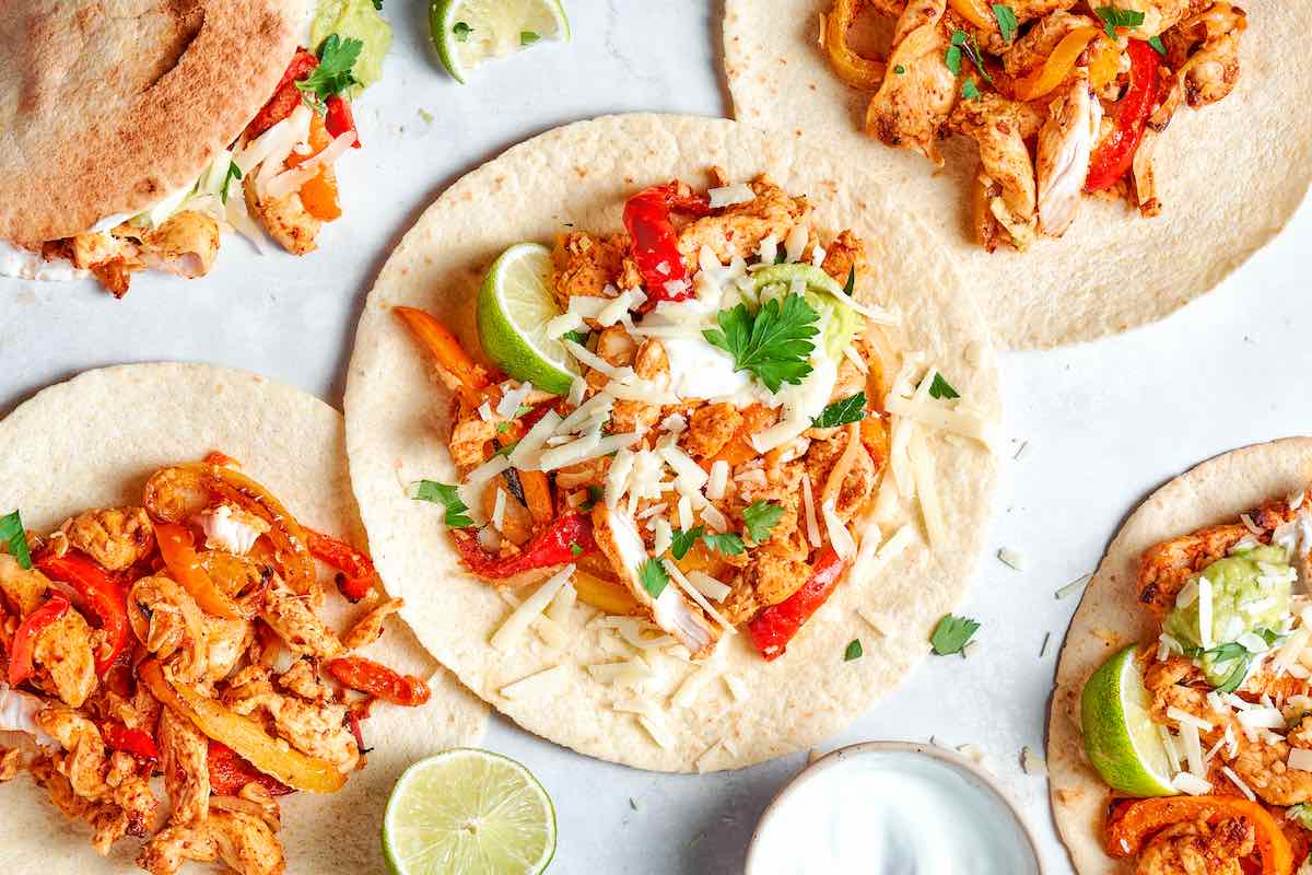air fryer fajitas assembled in tortillas. 