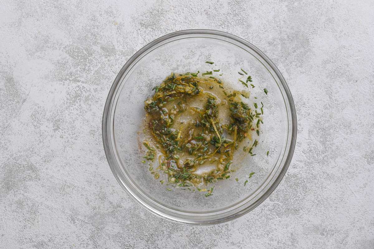 lamb seasoning in a mixing bowl with olive oil.